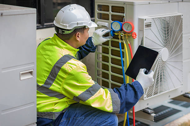 Professional Heat Pump Repair technician working in Genesee Depot, WI